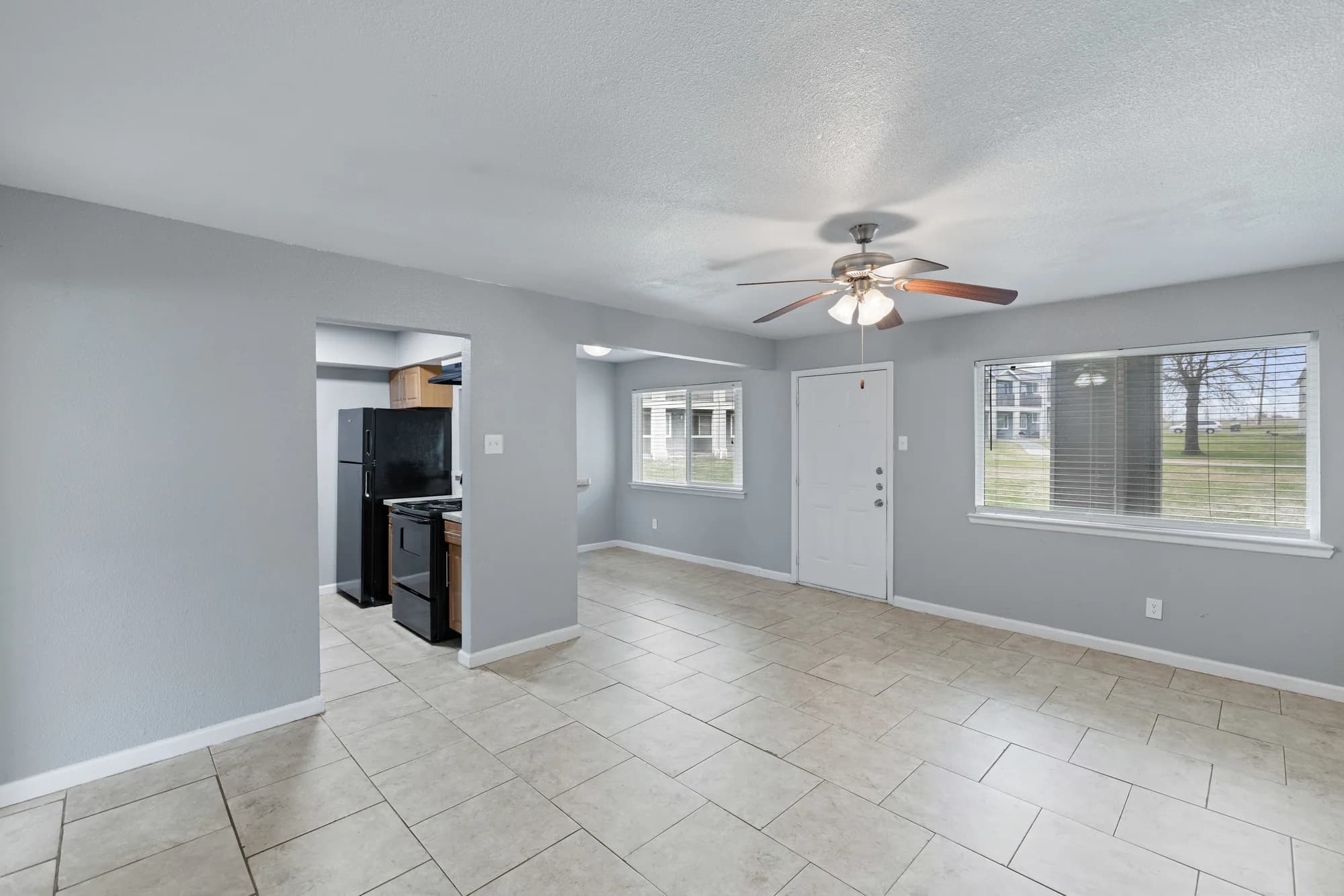 Bright Waverly apartment living area with tile flooring